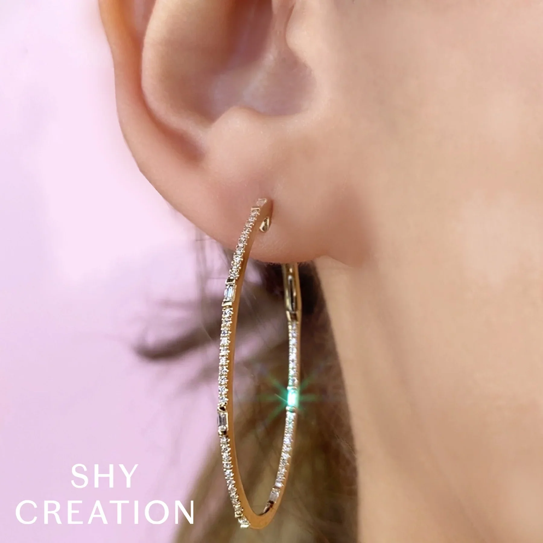 0.44ctw Diamond Baguette Oval Hoop Earring - Image 2