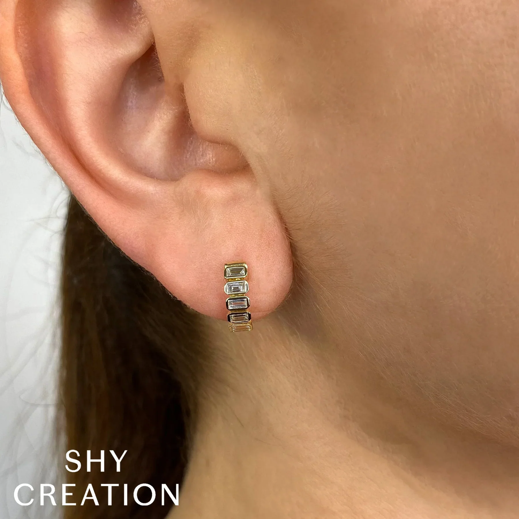 0.59ctw Diamond Baguette Huggie Earring - Image 2