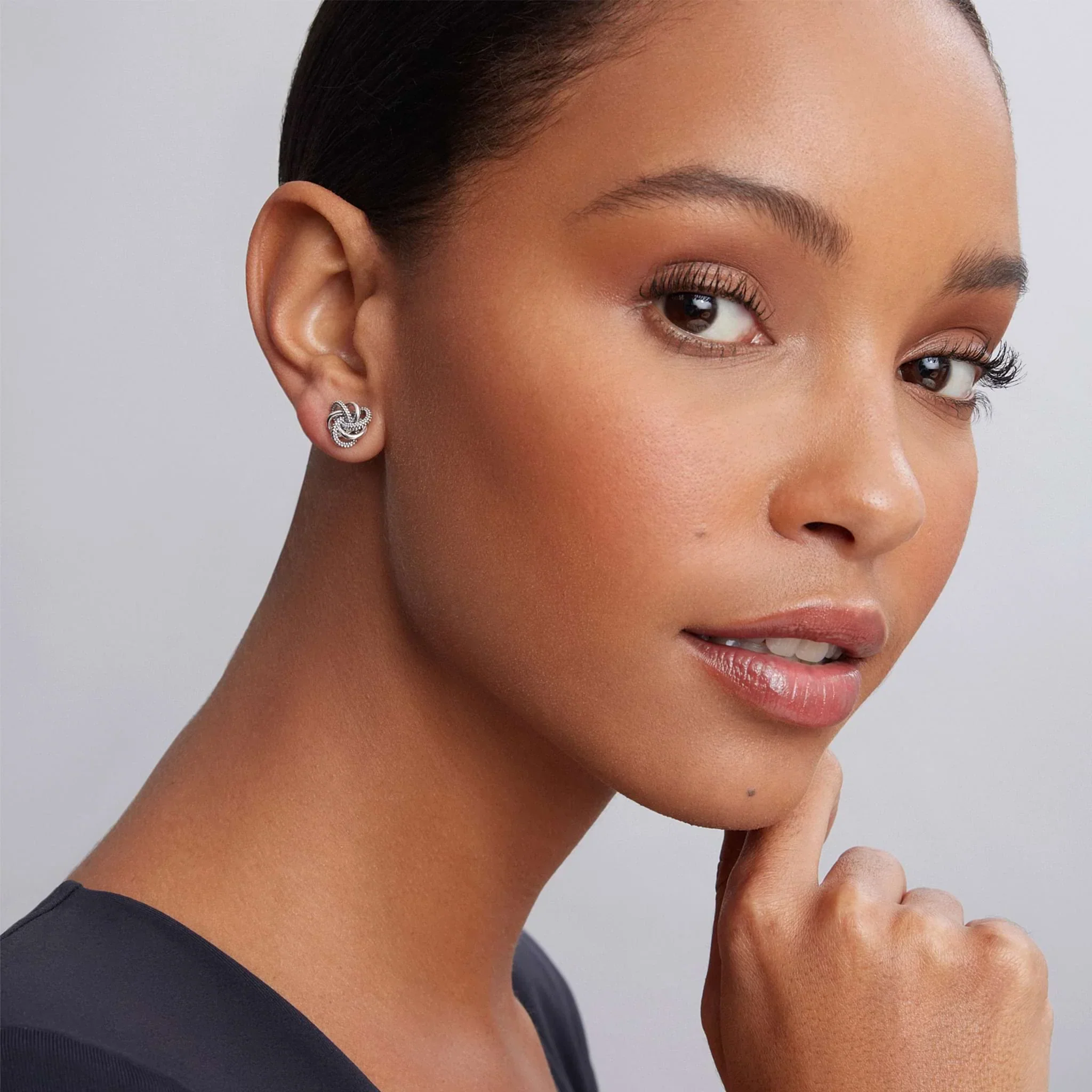 Small Silver Love Knot Stud Earrings - Image 2
